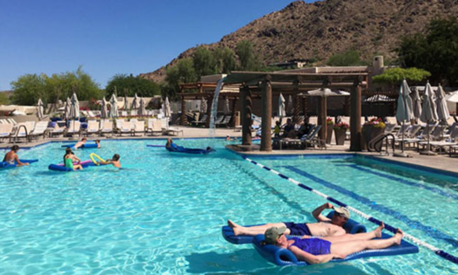 Hotel guests cool off at the pool at the JW Marriott Scottsdale Camelback Inn Resort and Spa in Paradise Valley, Ariz., on Sunday, June 19, 2016. States in the Southwest are in the midst of a summer heat wave as a high pressure ridge bakes Arizona, California and Nevada with extreme, triple-digit temperatures. Photo: Anna Johnson, AP