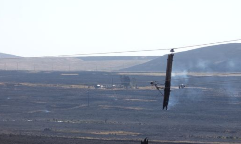 A power line near Midas, Nev., sustained damage from the Hot Pot fire that burned perilously close to the Elko County hamlet. Photo shot Monday, July 4, 2016. Photo: Shannon Jackson / Contributed to RGJ