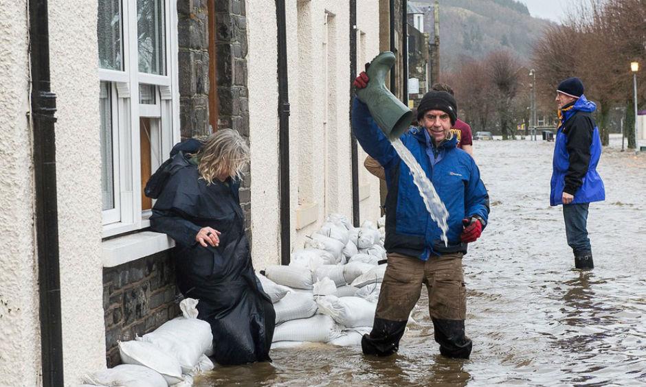Residents of Tweed Green, Peebles Flooding on Dec. 30, 2015. IMAGE: REX FEATURES/ASSOCIATED PRESS