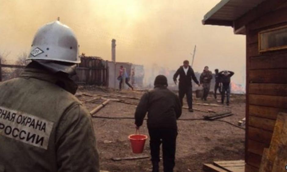 High winds spread the flames quickly across much of the Khakassia region. Image: EPA
