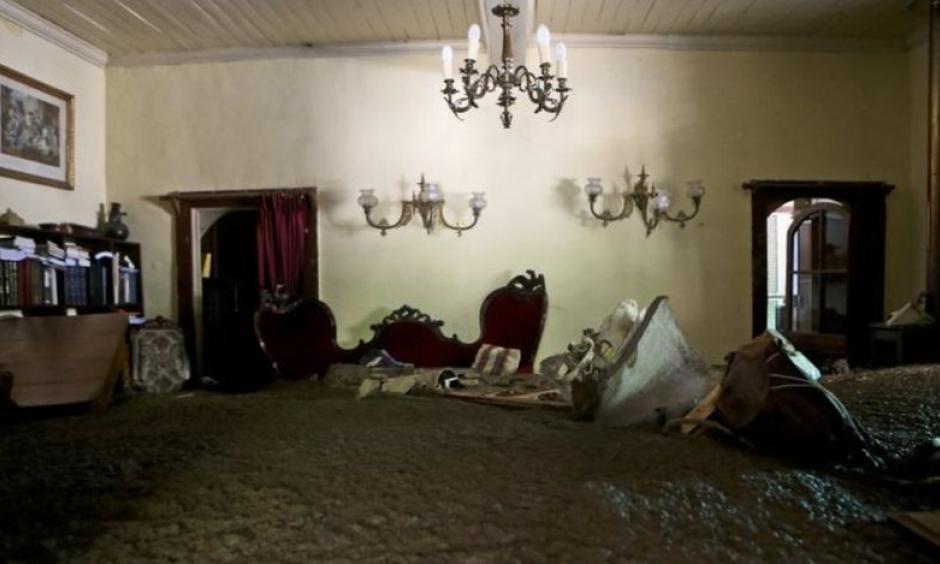 Some homes were filled with sludge as rivers overflowed. Photo: Associated Press