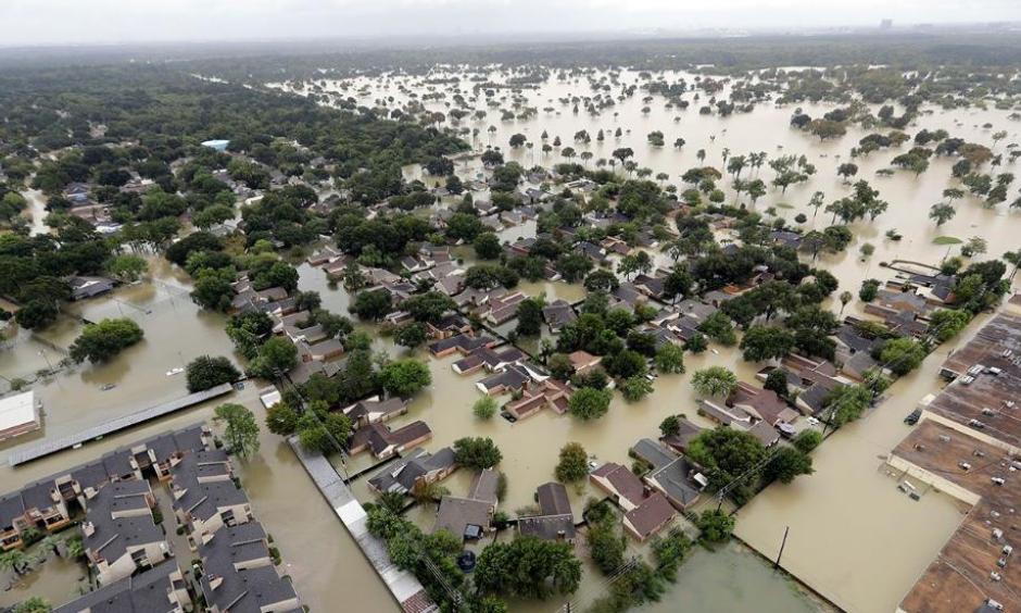 A neighborhood near Addicks Reservoir is seen flooded by rain from Harvey, Tuesday, Aug. 29, 2017, in Houston. Photo: David J. Phillip