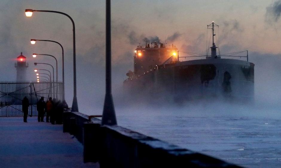 Steam rises from Lake Superior as the ship St. Clair comes to harbor on Sunday, Dec. 31, 2017, at Canal Park in Duluth, Minn. The ship arrived during the coldest holiday week (Dec. 25-31) ever recorded in Duluth. The average temperature for the seven-day period, including both highs and lows, was a bone-chilling –12.1°F. Photo: David Joles, Star Tribune via AP