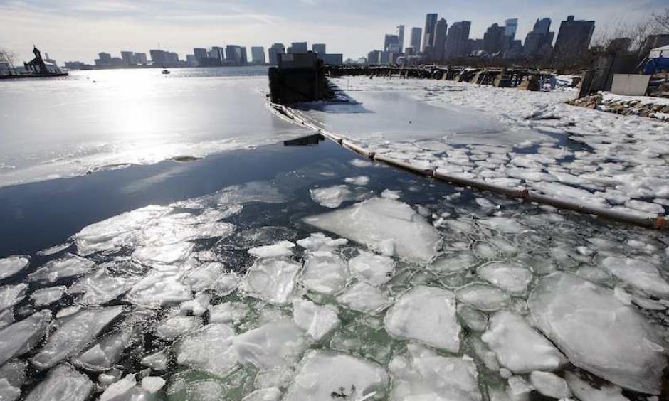 ea ice floats in Boston Harbor on Wednesday, Jan. 3, 2018. The ice could exacerbate the impacts of Thursday’s intense coastal storm. Photo: Michael Dwyer, AP