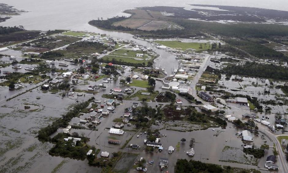 Flooding and storm surge related to Hurricane Florence inundate the town of Engelhard, N.C., on Saturday, Sept. 15, 2018. Engelhard is one of many communities on the west side of Pamlico Sound affected by some of the largest storm surge associated with Florence's slow-motion approach. Credit: AP Photo, Steve Helber