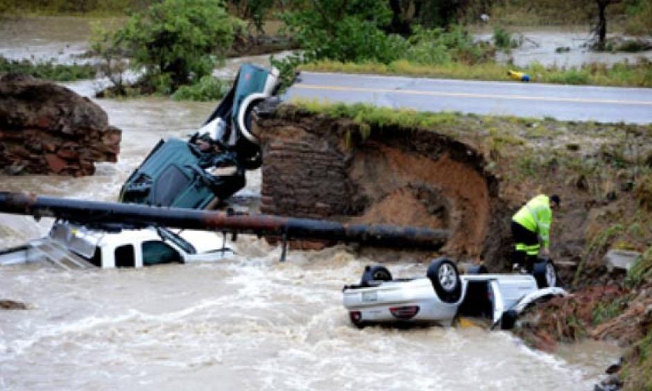 Bridge washout and its results at Highway 287 and Dillon Rd. in Lafayette just east of Boulder. Photo: Cliff Grassmick, Boulder County News
