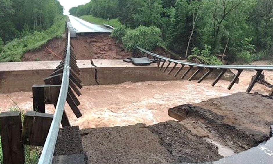 Flash flooding washed out U.S. Highway 2 at North Fish Creek, about 10 miles west of Ashland, Wis., on Sunday. Credit: Wisconsin Department of Transportation