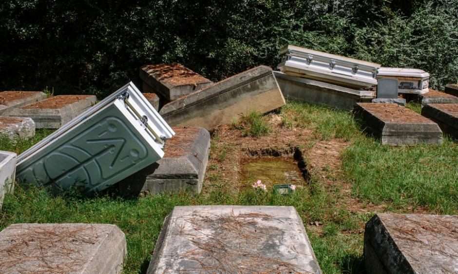 A number of coffins had either been moved or washed away by floods this year in Denham Springs, La. Photo: William Widmer for The New York Times