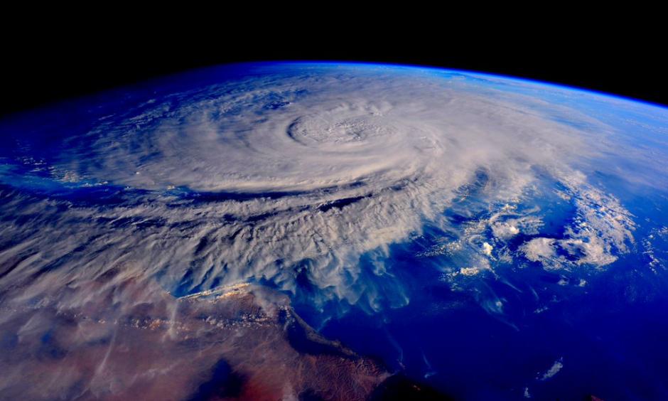 Tropical Cyclone Chapala as seen from the International Space Station at sunset on Halloween evening, October 31, 2015. At the time, Chapala was a Category 4 storm with 135 mph winds. The coast of Oman/Yemen is visible at the bottom of the image. Image: Commander Scott Kelly