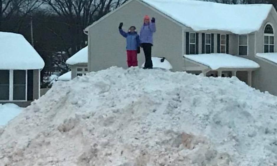 Epic snow pile the result of a 2 week deep freeze with days of heavy snowfall in the Syracuse NY area.This view is from my home's front window Monday. Photo: Mike Brookins via Twitter