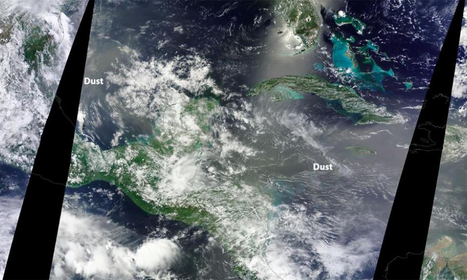 The light brown areas show the hazy conditions associated with Saharan dust in the western Gulf of Mexico and western Caribbean June 20. Image: NASA