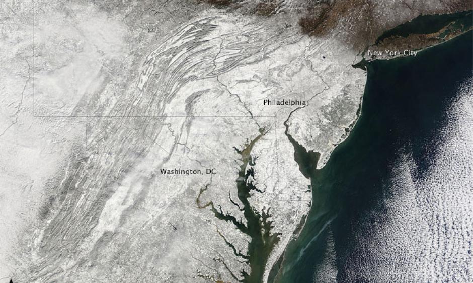 Nicknamed “snowpocalypse” and “snowmageddon,” an exceptionally severe winter storm dropped several feet of snow around the Washington, D.C., area in early February 2010. Image: NASA