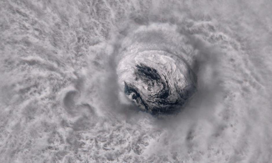 The massive circular eye of Hurricane Jose is seen from space at super high resolution. Convection is visible in the clouds that surround the well-defined eyewall, and the whitecaps of waves can be glimpsed through the center of the eye. Photo: Sentinel-2A satellite