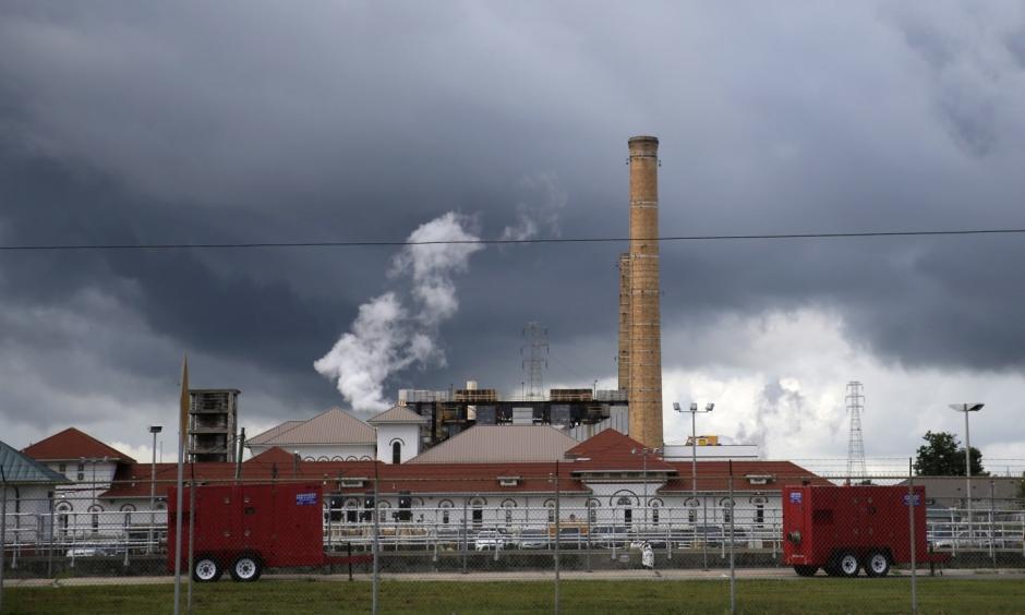 Rain clouds gather over the New Orleans Sewerage & Water Board facility, where turbines that power pumps have failed, in New Orleans, Thursday, Aug. 10, 2017. Photo: Gerald Herbert, Associated Press