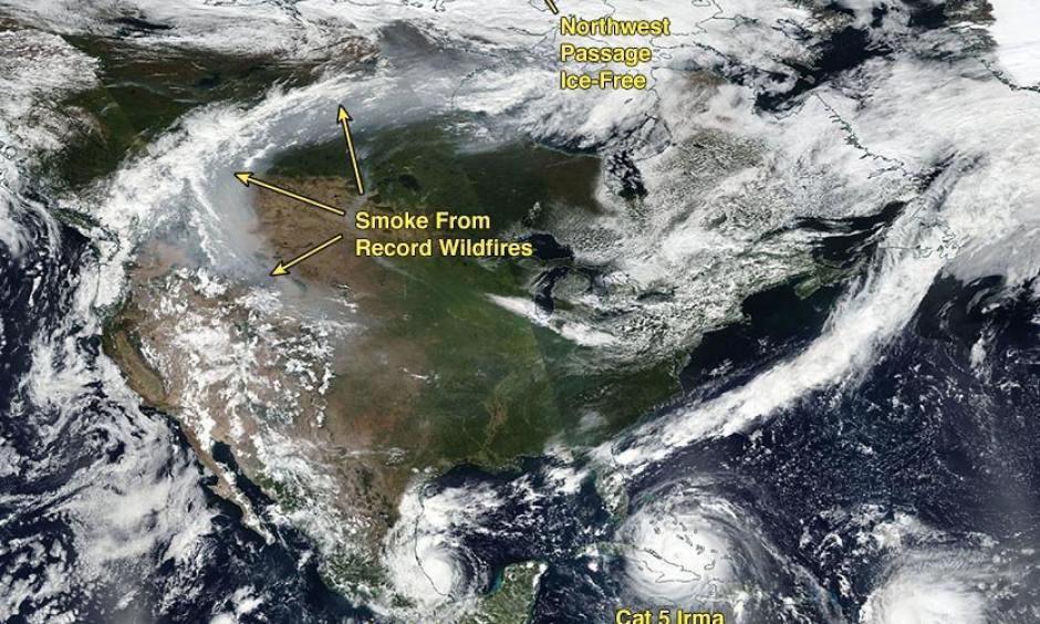 The future was now in 2017. In a scence that climate scientists say we should see more of in a future warmer climate, the GOES-16 satellite image from September 8, 2017 showed multiple intense hurricanes in the Atlantic, along with smoke from large wildfires and an ice-free Northwest Passage. Image: Weather Underground | Category 6