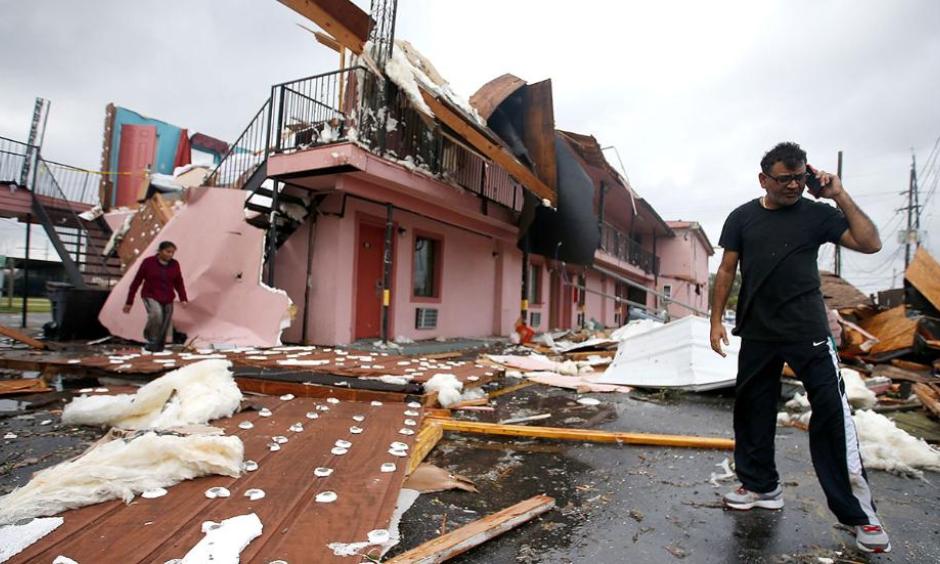 A man walks through the debris of what once was a motel on Chef Menture Ave. after a tornado touched down on February 7, 2017 in New Orleans East, Louisiana. According to the NWS, 25 people were injured in the aftermath of the tornado. Photo: Sean Gardner, Getty Images