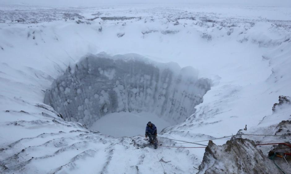 A 100-foot-wide permafrost crater in Siberia's Yamal Peninsula.Photo: Vladimir Pushkarev / Russian Centre of Arctic Exploration