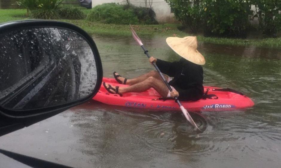 A resident kayaking on the flooded streets of Miami Beach on Tuesday. Photo: Nick Namias
