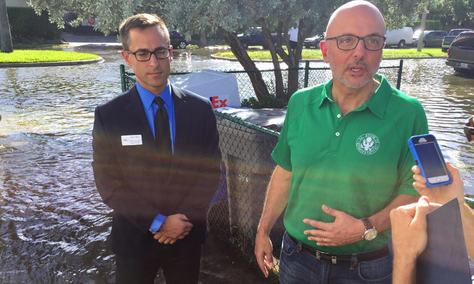 U.S. Representative Ted Deutch wades through tidal flooding in Fort Lauderdale on Oct. 17, 2016. Photo: Peter Haden, WLRN