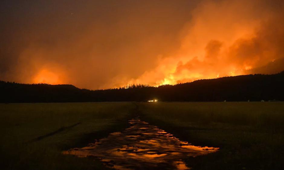 A wildfire burns in the Lolo national forest in Montana in August. The severe drought has served as ideal conditions for continued fires. Photo: Rion Sanders/AP