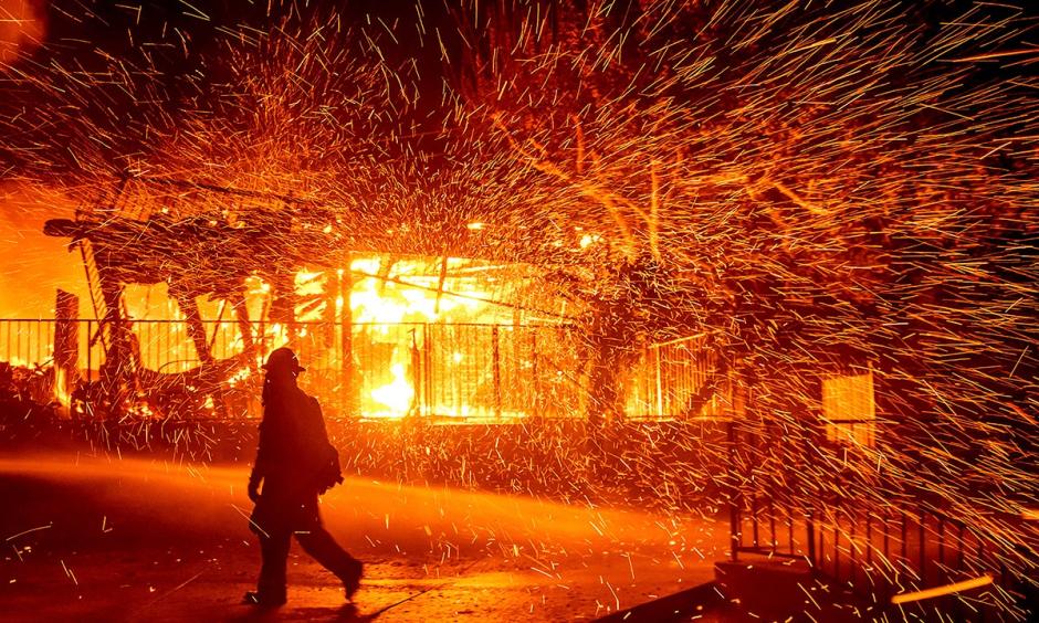 A new wildfire forced people to evacuate their homes in the middle of the night in San Bernardino, California.
