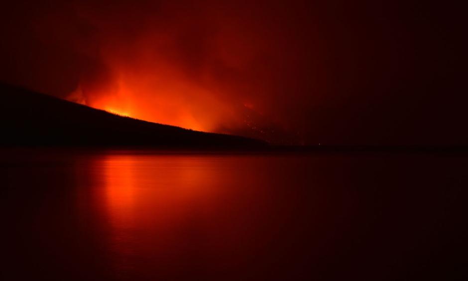 A night view of the Howe Ridge Fire on the shores of Lake McDonald. Photo: Glacier National Park