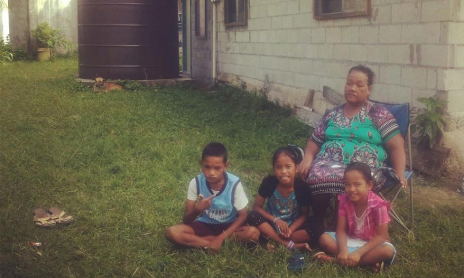 Rusina Rusin on April 16, 2015, with her grandchildren, including Keslynna Myo Sibok, right, at their home in the part of the Marshall Islands' Majuro Atoll that is most vulnerable to flooding.Photo: Renee Lewis, Al Jazeera