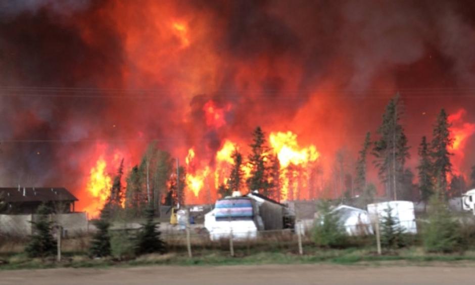 A trailer park engulfed in flames near Fort McMurray, Alta. Tuesday, May 3, 2016. Photo: Breanna Karstens-Smith, CTV News