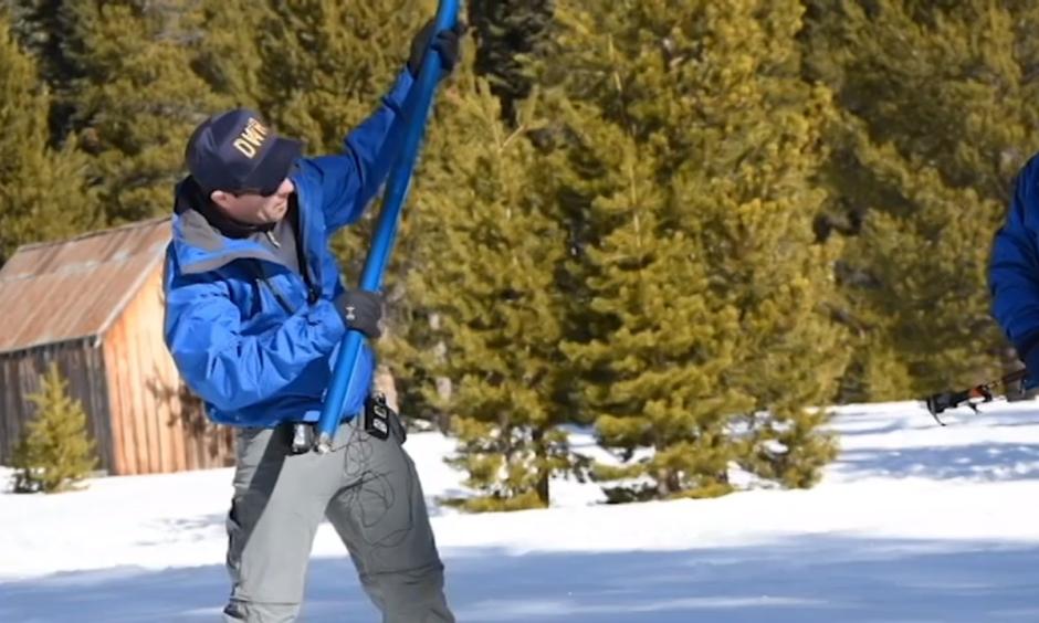 John King, a DWR water resource engineer who conducted the survey, discusses the snowpack in Phillips, California. Photo: Vincent Moleski