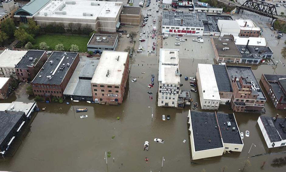 An aerial view of Davenport, Iowa, which remains flooded after a temporary levee broke. Credit: Facebook.com/QC DRONE, Newscom