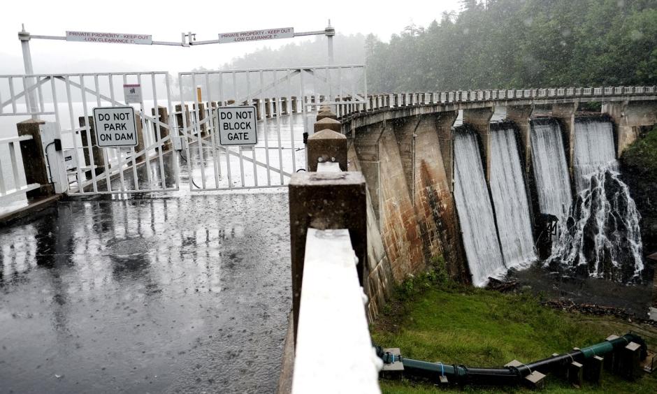 Rain falls at the Lake Tahoma Dam near Marion, N.C., on June 13. Excessive rain in the region recently led to mudslides and flooding, and many worried that the dam might be compromised, leading to evacuations. Photo: Bonnie Jo Mount, The Washington Post