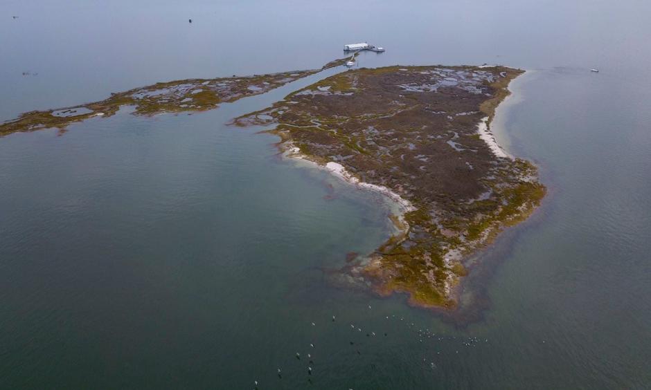 An aerial view of the lodge on Fox Island. The Chesapeake Bay Foundation's Fox Island Environmental Education Program will be closing for good because of rising sea levels and erosion. Credit: Ricky Carioti/The Washington Post