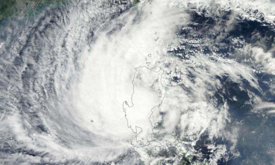 MODIS image of Typhoon Koppu over Luzon Island in the Philippines as seen from NASA's Terra satellite on Sunday, October 18, 2015. At the time, Koppu was a Category 2 storm with 105 mph winds. Image credit: NASA.