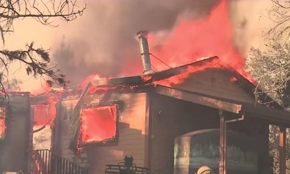 Over 1,100 firefighters are currently battling the Ponderosa Fire in Butte County that has destroyed ten homes. A suspect was arrested in connection with the fire Tuesday.