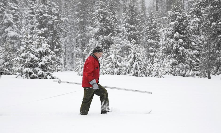 Frank Gehrke of the California Department of Water Resources surveys the snowpack at Phillips Station near Echo Summit, Calif. Photo: Rich Pedroncelli / Associated Press