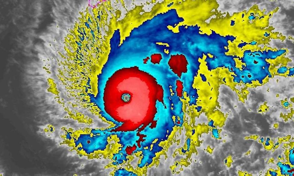 Enhanced infrared image of Hurricane Lane at 0400Z Wednesday, August 21, 2018 (midnight Tuesday night EDT). The southernmost part of the Big Island is outlined in pink at top center. Credit: NOAA/NESDIS