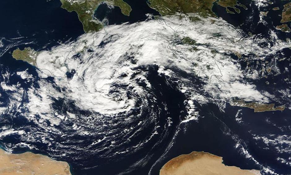 MODIS satellite image of the medicane approaching Crete taken on Sunday afternoon, October 30, 2016. John Knaff (CIRA/RAMMB/Colorado State University) produced this large-scale black-and-white satellite loop. Image: NASA