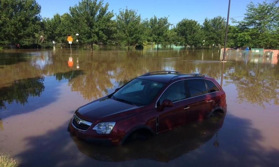 A car sits in the parking lot of Midland's downtown farmers' market. Photo: Stve Carmody, Michigan Radio