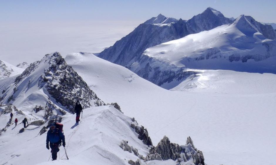 The distant summit of Mount Vinson in Antarctica, rising to 4,892 meters, is higher than Mont Blanc (4,810 metres) in the European Alps. Photo: Torch Magazine via Flickr