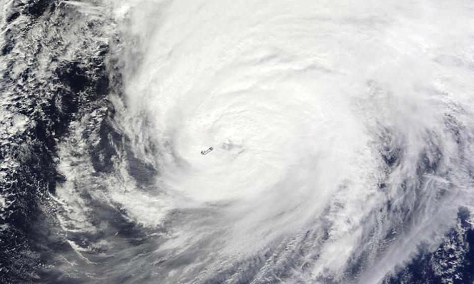 MODIS satellite image of Hurricane Nicole taken at 11:30 am EDT October 13, 2016. At the time, Nicole had just hit Bermuda as a Category 3 storm with 120 mph winds. Image: NASA