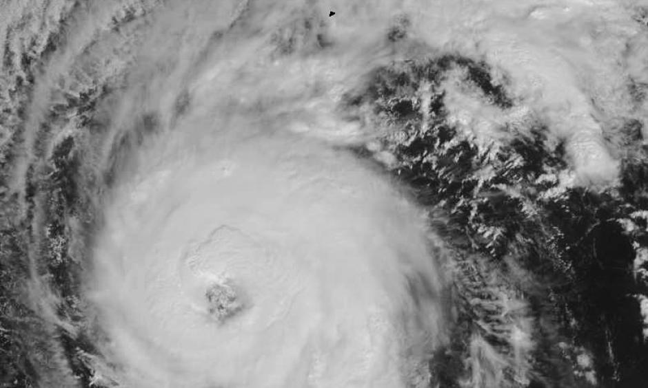 Visible satellite image of Hurricane Nicole as of 1437Z (10:37 am EDT) Wednesday, October 12, 2016. Bermuda is visible as the black speck at center top. Image: NASA/MSFC Earth Science Office