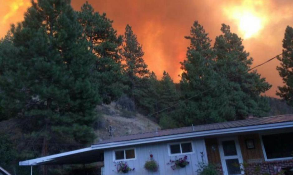 Dean Fox snapped a photo of his home before it was consumed Friday, Aug. 14, 2015, by the Canyon Creek Complex fire near John Day. As of Saturday, officials said at least 26 homes had been destroyed by the massive wildfire near John Day. Photo: Dean Fox, Les Zaitz, The Oregonian
