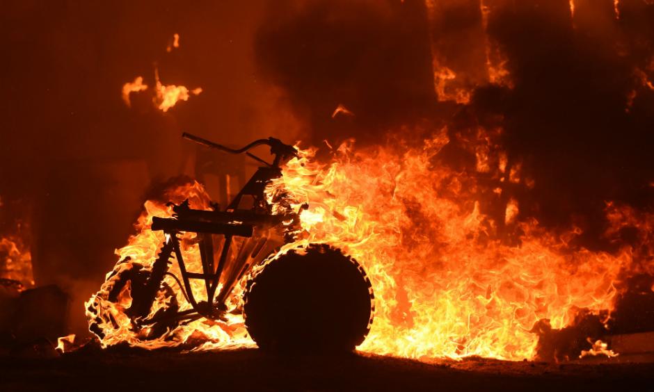 An early July heat wave dried out scrub and underbrush, fueling wildfires across California and the West that destroyed homes and forced thousands of people to evacuate. Photo: Josh Edelson, AFP/Getty