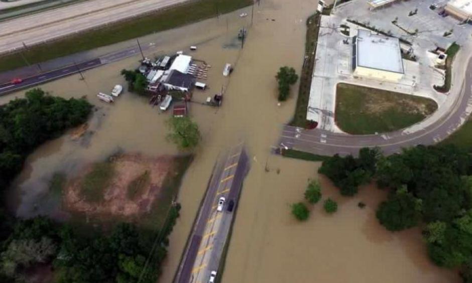 Flood waters cover the area of FM 1463 at IH-10 in Fort Bend County, Texas, U.S. April 19, 2016. Photo: Texas DOT-Houston, Handout via REUTERS