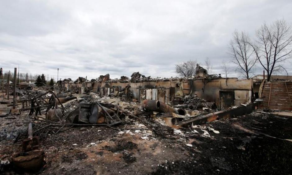 Burned out homes are pictured in the Abasand neighbourhood of Fort McMurray, Alberta, Canada, May 9, 2016 after wildfires forced the evacuation of the town. Photo: Chris Wattie, Reuters