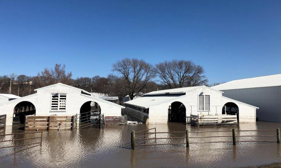 File photo: Paddocks at Washington County Fairgrounds are shown underwater due to flooding in Arlington, Nebraska, U.S., March 21, 2019. Photo: Humeyra Pamuk, Reuters