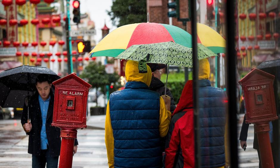 Pedestrians carry umbrellas while walking in the rain in downtown San Francisco on Friday, Feb. 8, 2019. Photo: David Paul Morris, special to the San Francisco Chronicle