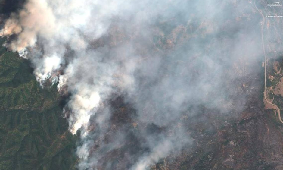 A satellite image shows the 416 Wildfire burning west of Highway 550 and northwest of Hermosa, Colorado, U.S., June 10, 2018. Credit: Maxar company, via REUTERS