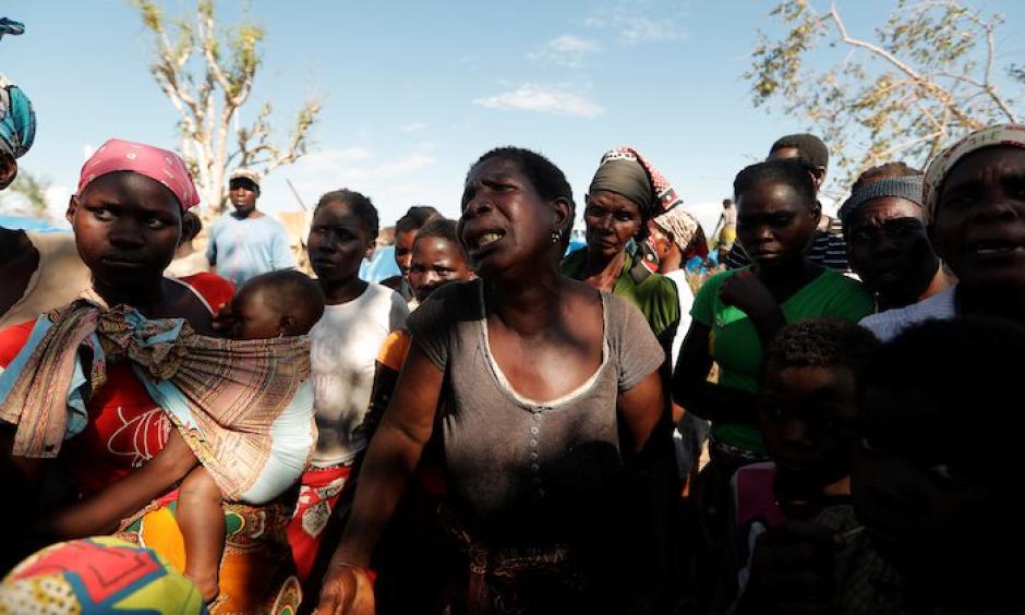 A woman complains about lack of food at a camp for people displaced by Cyclone Idai near Beira, Mozambique. Photo: Zohra Bensemra, Reuters