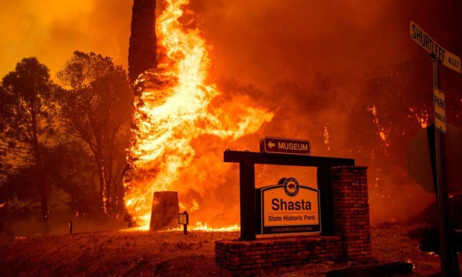 The Carr Fire tears through Shasta on July 26, 2018. Credit: Noah Berger, AP